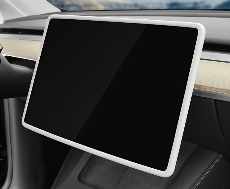 A large rectangular car infotainment touchscreen display with a white bezel, shown mounted inside a vehicle cabin. TESLA_MODEL_Y_JUNIPER_TESLA_MODEL_3_HIGHLAND_16_SCREEN_YL_SCREEN_SILICONE_EDGE_PROTECTOR_BLACK_GREY_WHITE_BUY_FROM_IRELAND_AND_EUROPES_TESLARY.EU_TESLARY.FI_TESLARY.SE_TESLARY.ES_TESLARY.PT_TESLARY.CO.UK_TESLARY.IE
