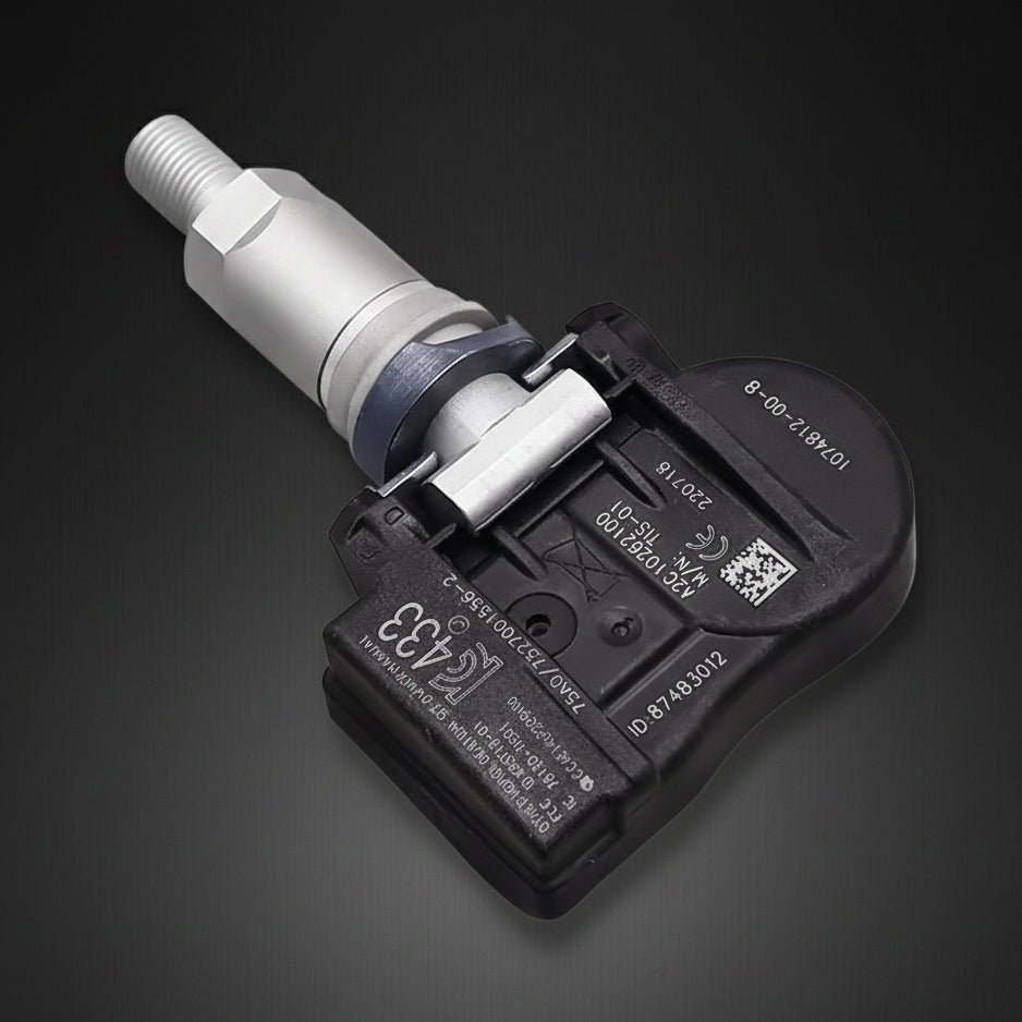 A automotive tire pressure sensor with a black plastic housing and a silver metal probe, shown on a plain white background.